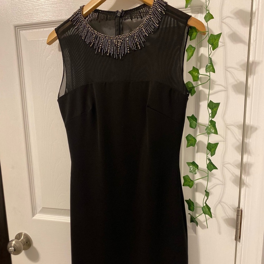 Elegant black dress with Beaded neckline